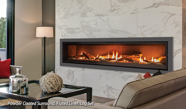 Enviro C72 linear gas fireplace stretching across a marble wall