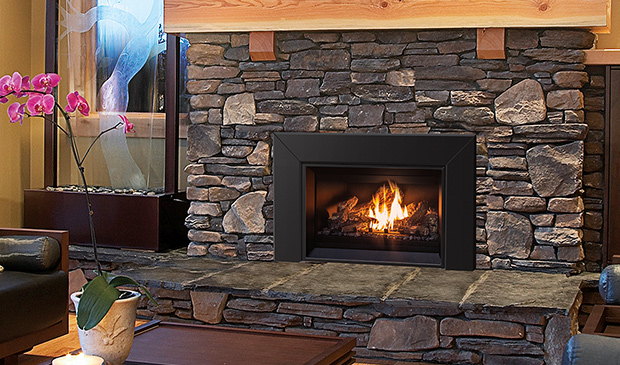 Enviro E25 insert in a stone wall beside an orchid