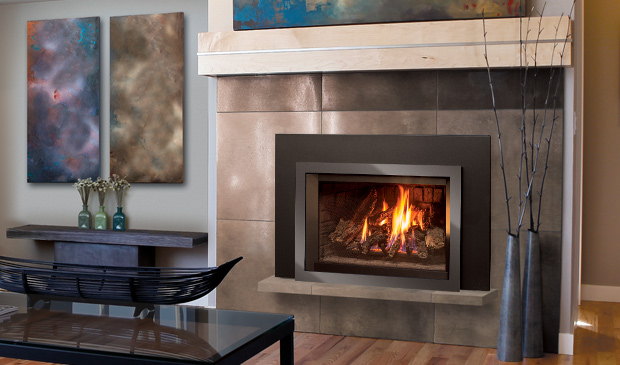 Enviro E30 insert below a marble mantel beside modern art