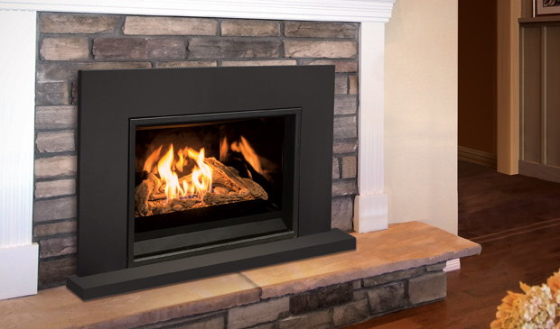Enviro E30 insert set in a dark stone fireplace