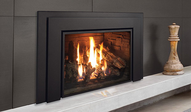 Enviro E44 insert in a black modern surround beside a chess piece
