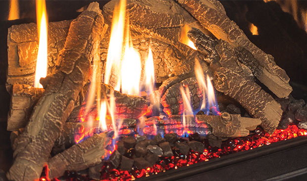 Log set over glowing red ember media in the Enviro EX32