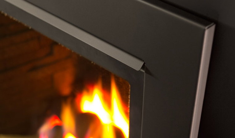 Close view of the Enviro Q1 insert bezel and flame