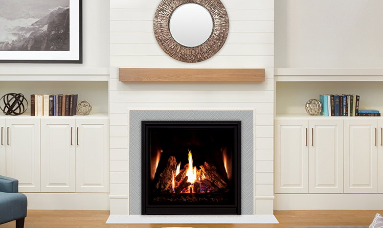 Enviro Q3 gas fireplace in a white shiplap wall below a round mirror