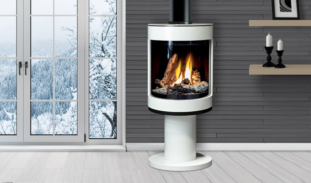 White Enviro S50 cylindrical gas stove by a snowy window