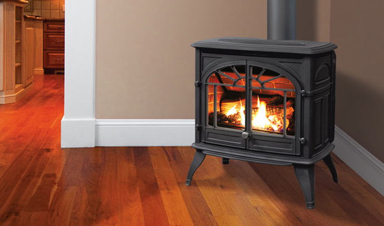 Enviro Westport cast iron gas stove on a wood floor