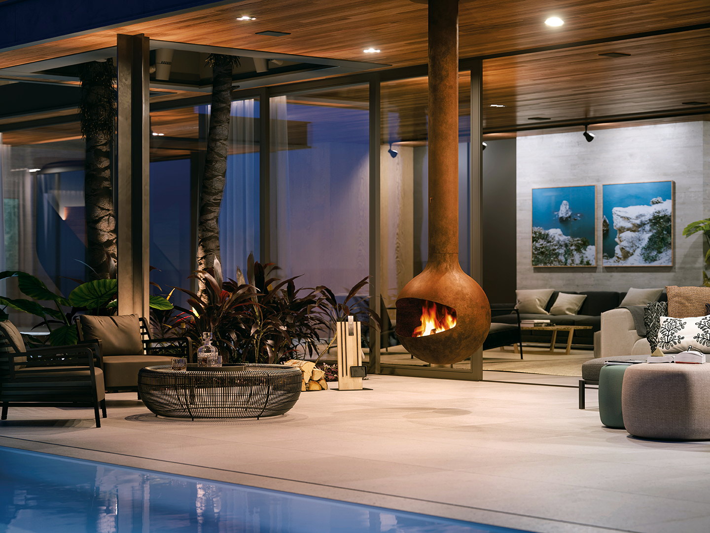Rust Bathyscafocus glowing over a night-lit pool terrace with palms