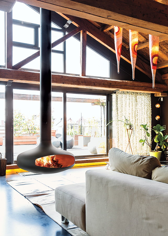Black Domofocus bowl burning under exposed attic beams beside a terrace door