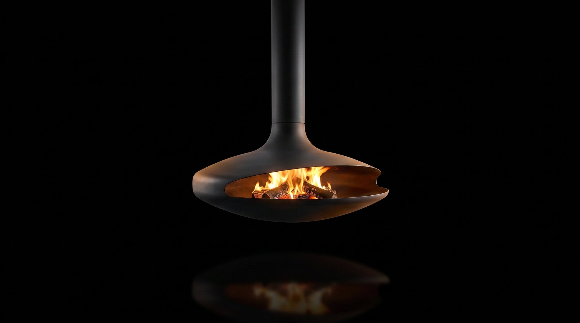 The Gyrofocus face on, saucer hearth with the beak-lip opening, fire alight