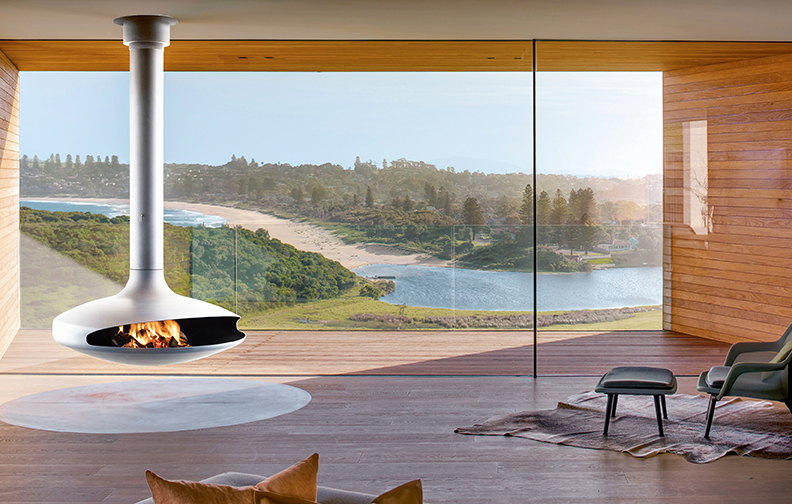 White Gyrofocus hanging in a timber-ceiling room overlooking a coastal lagoon