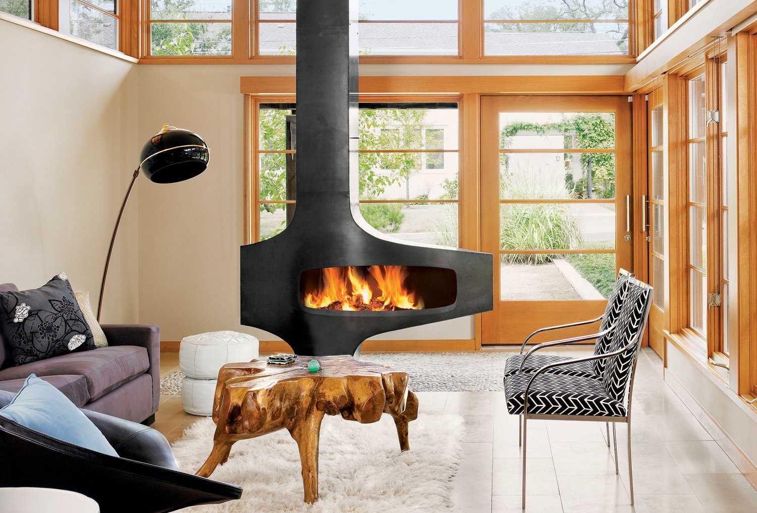 The Heterofocus's offset hearth wide open, seen close in a glass-walled living room