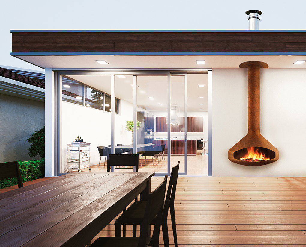 Rust Paxfocus on a white outdoor wall beside a long timber dining table