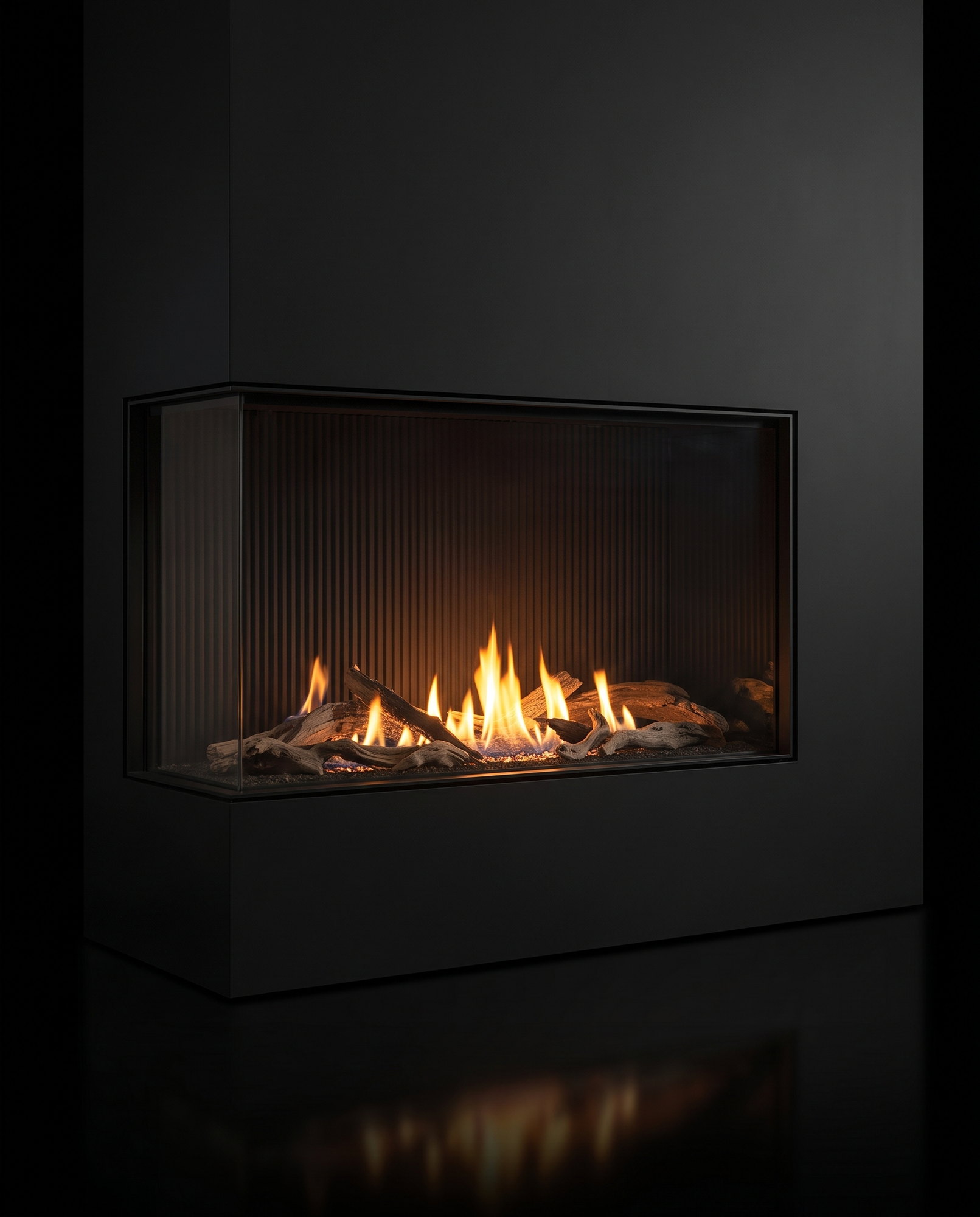 The U50 Tall Bay from the front-left — fire wrapping the corner, on the black void
