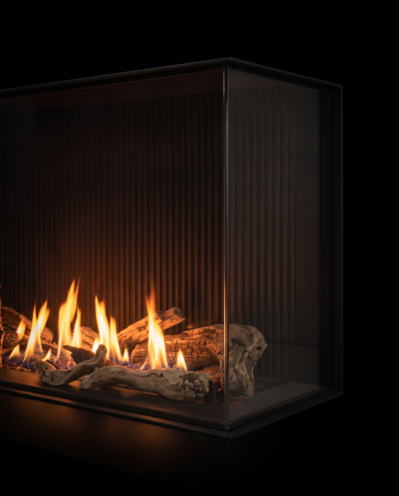 The glass-to-glass corner of the U50 Tall Bay, fire behind both panes