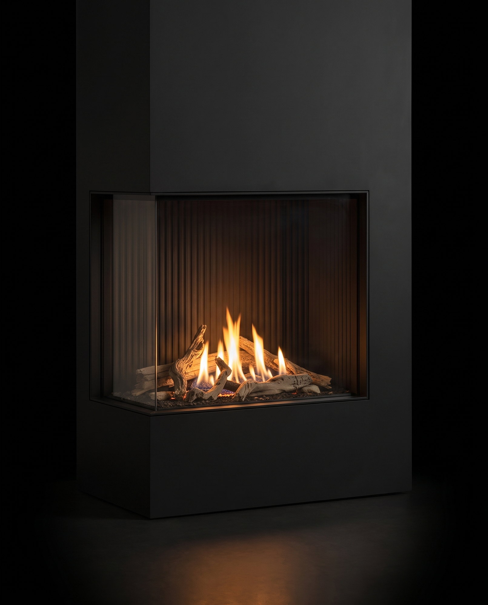 The U30 Tall Bay from the front-left — fire wrapping the corner, on the black void
