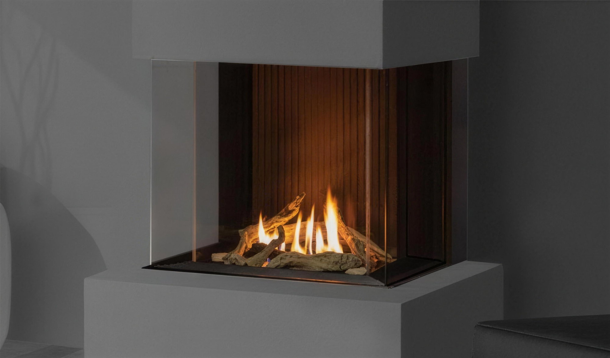 Urbana’s own render of the U30 Tall Bay — three-sided glass, driftwood fire