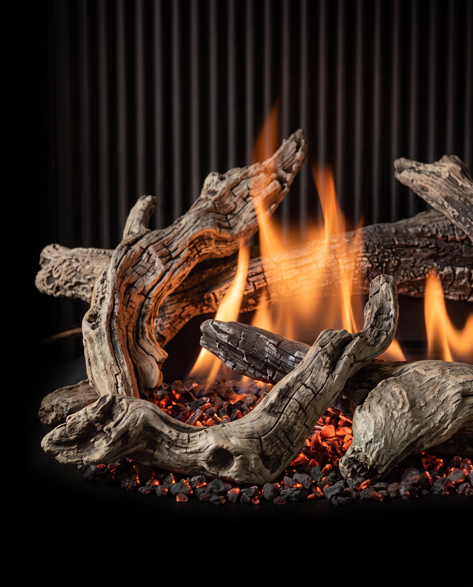 The U30 Bay&rsquo;s driftwood logs over the glowing ember bed, up close