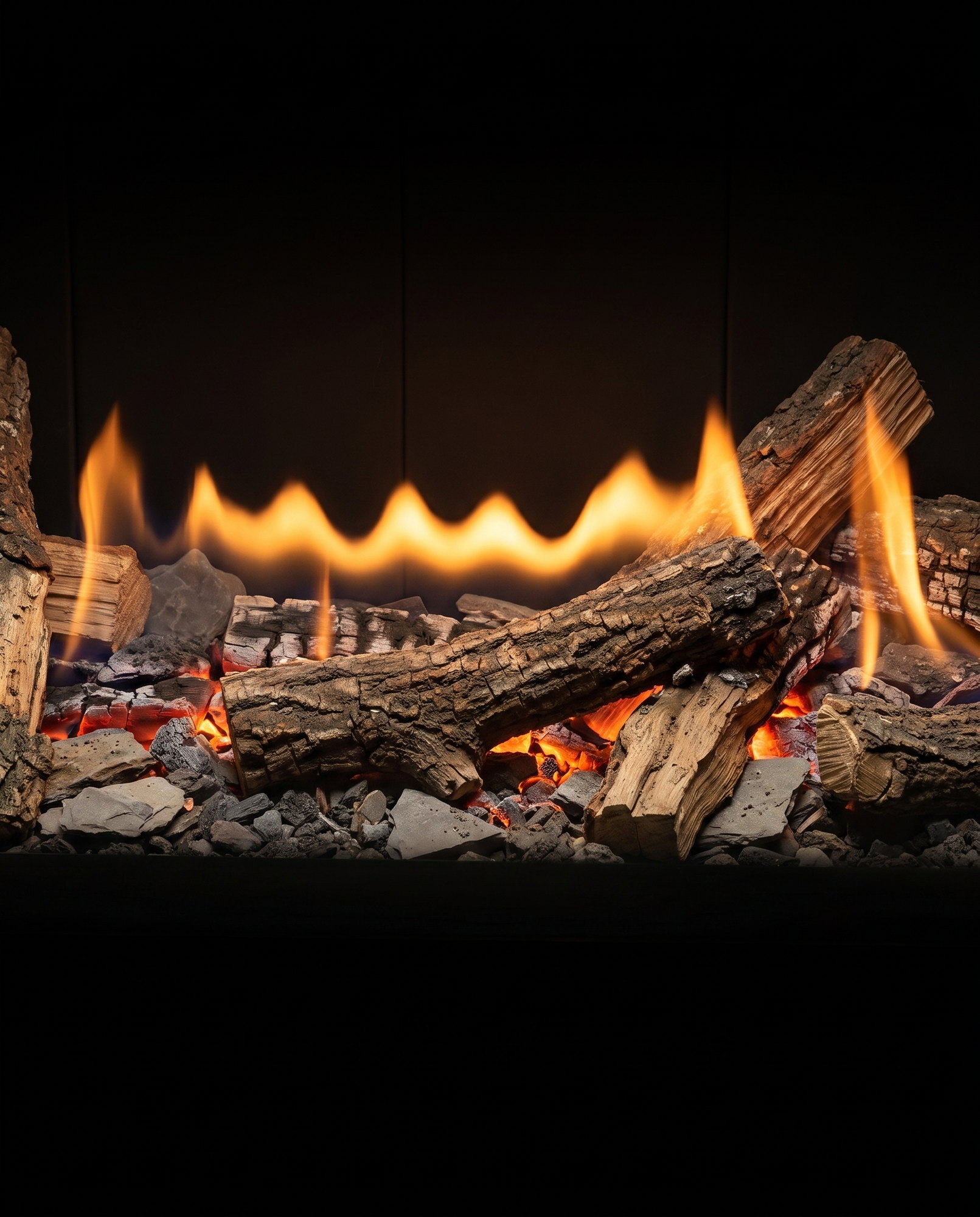 The U70 Linear’s split oak and shale bed up close, the burner ribbon behind