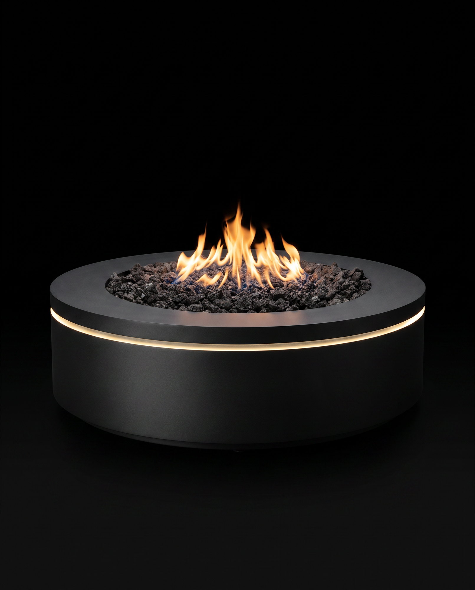 The Halo 40R &mdash; low black steel drum, charcoal lava rocks, LED ring, on the black void