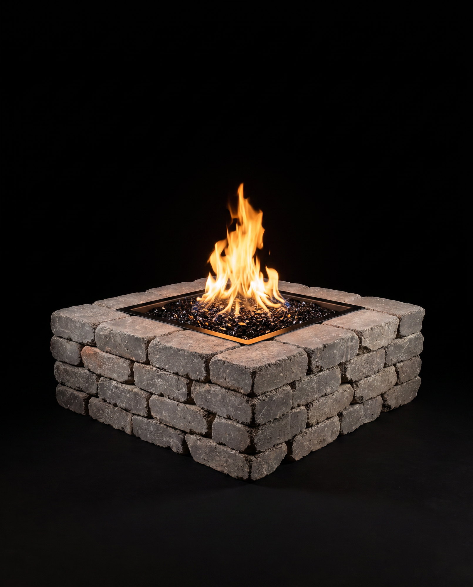 The Halo 44S Brick &mdash; a square pit of stacked weathered brick with black glass in its steel tray