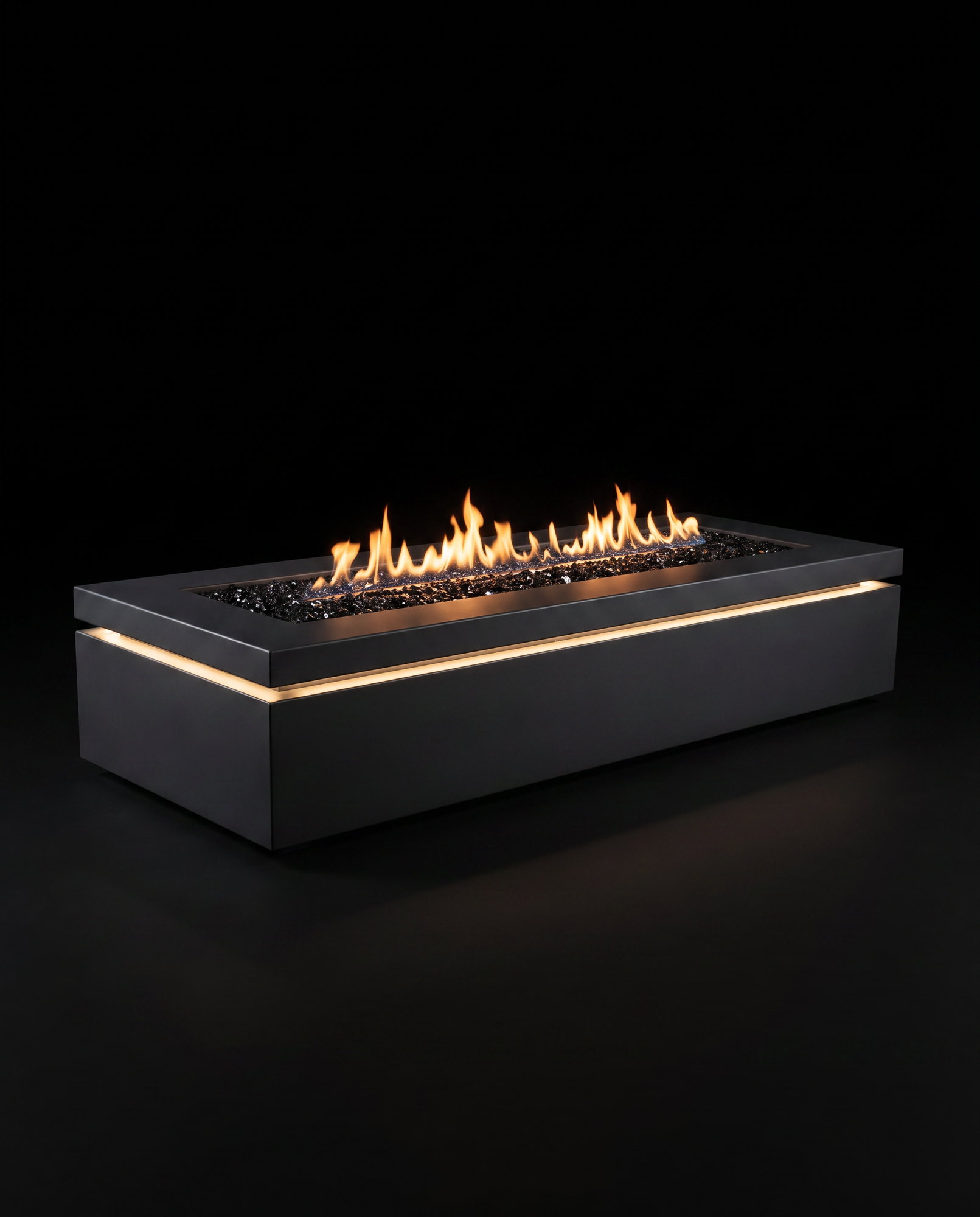 The Halo 60L &mdash; the long low steel trough, a ribbon of flame running its full length, LED underline