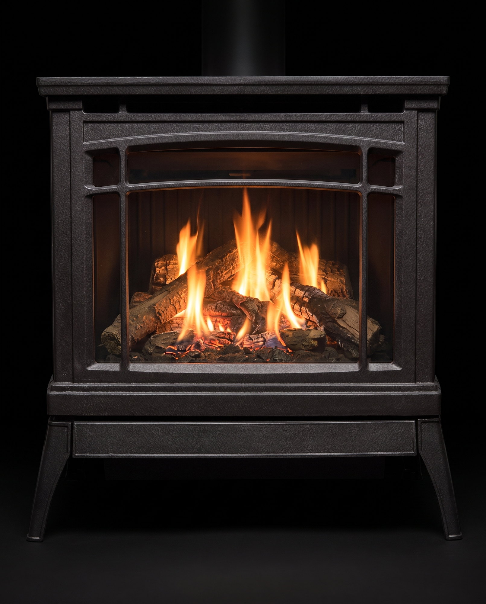 The Berkeley’s arch glass dead-on — corner grilles, full log fire, side panels at both edges
