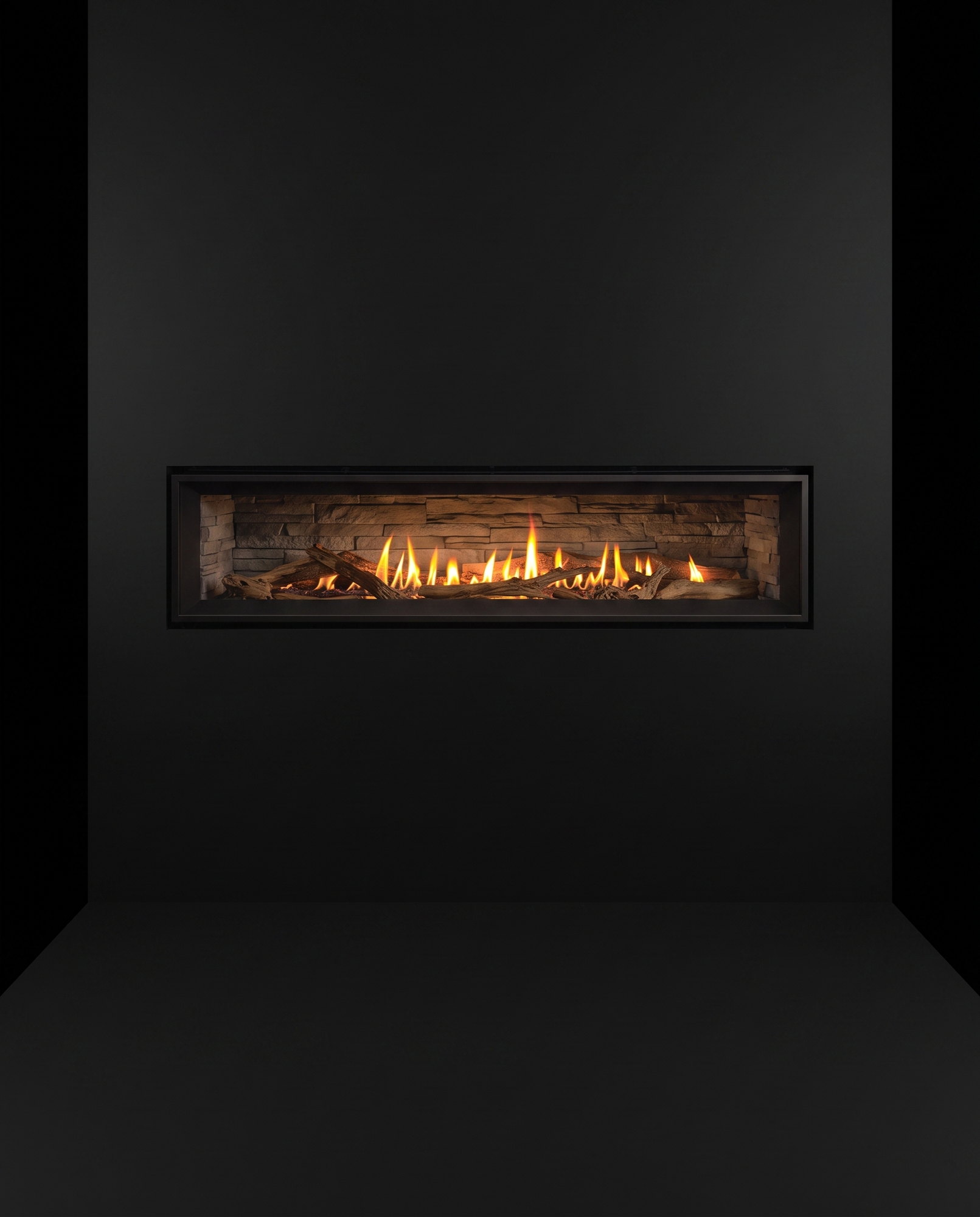 The C60’s full face dead-on — the ribbon of flame over its ledgestone liner