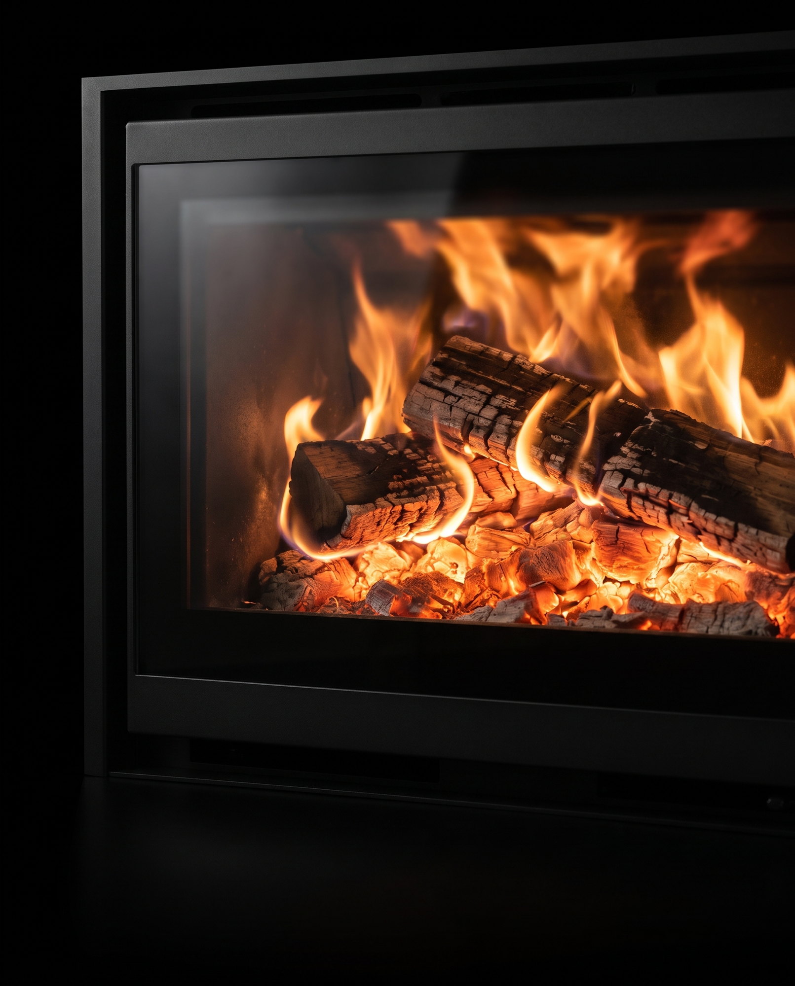 The 6-in’s split-log fire up close through the glass