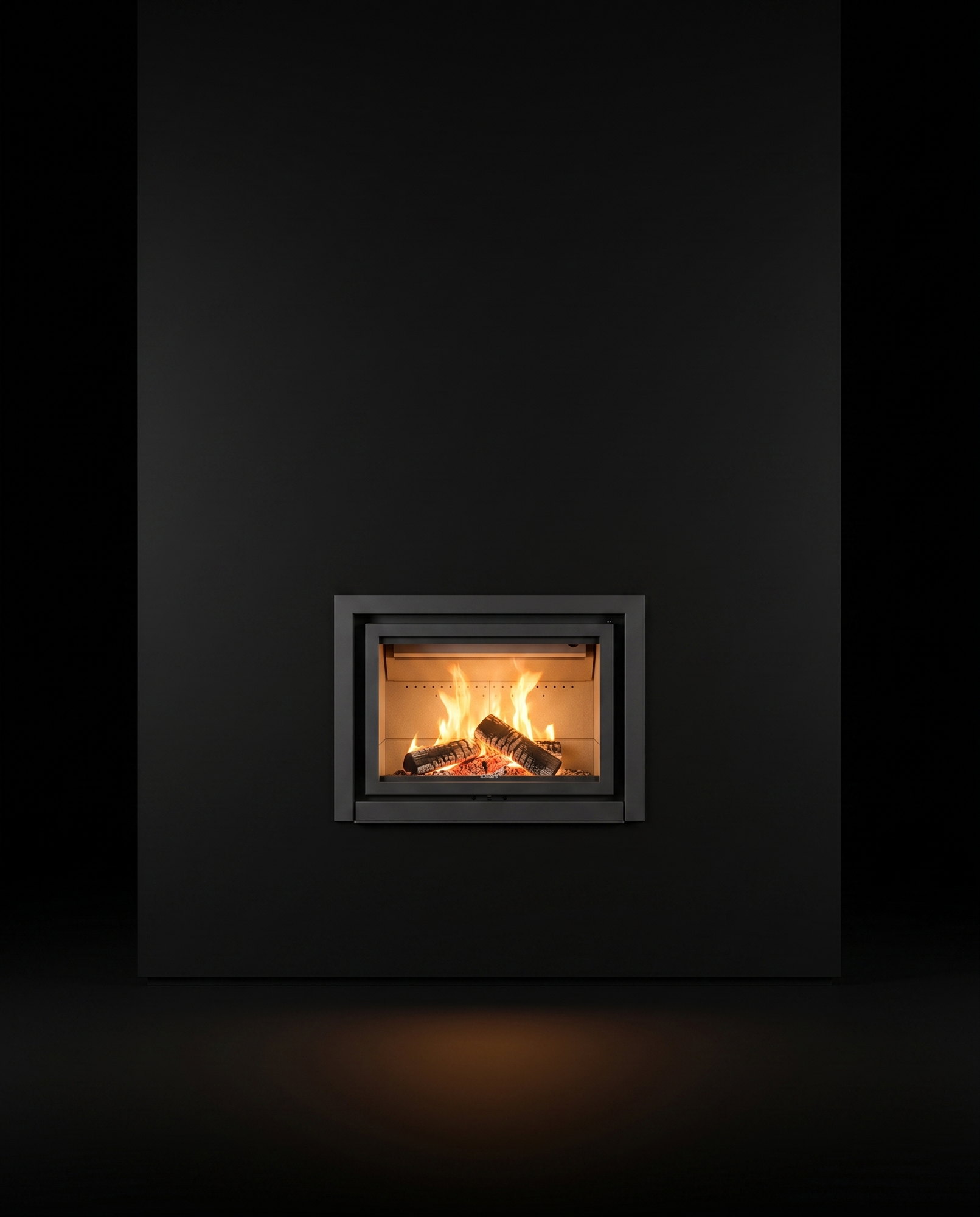 The 16-in small and glowing in a broad black chimney breast