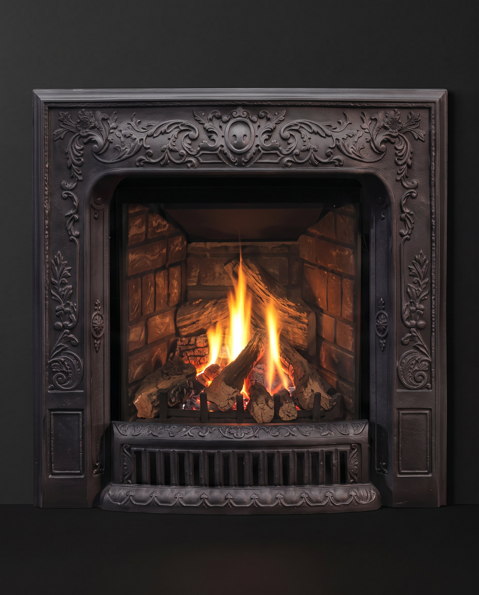 The Enviro Q1 Insert face dead-on, fire lit