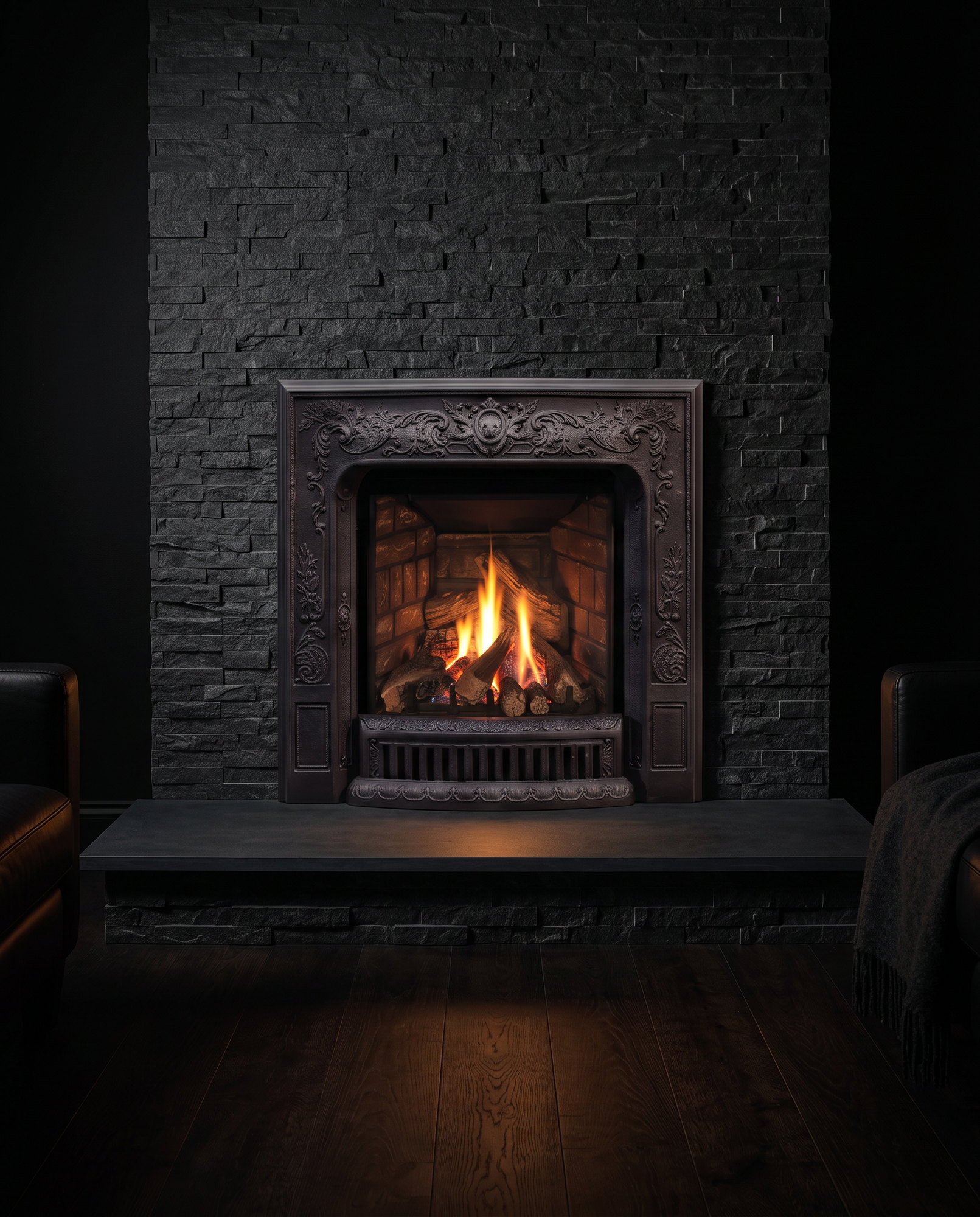 The Enviro Q1 Insert in a dark stone chimney breast