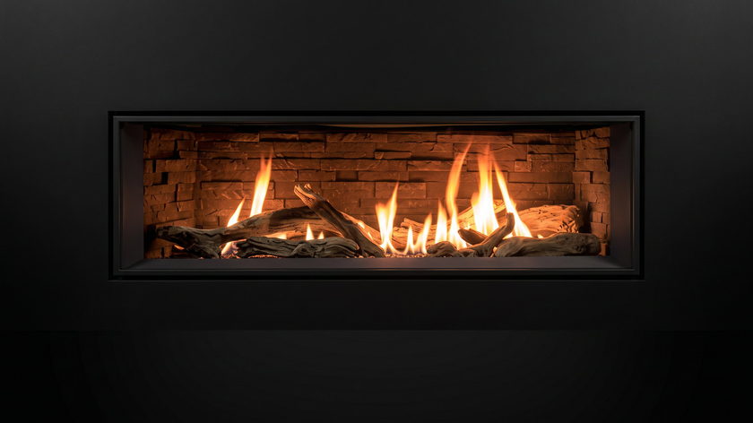 The Enviro C44 — gas fireplace — burning in the black studio void