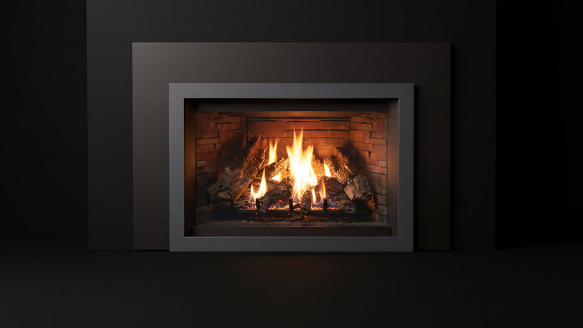 The Enviro E30 — gas fireplace insert — burning in the black studio void