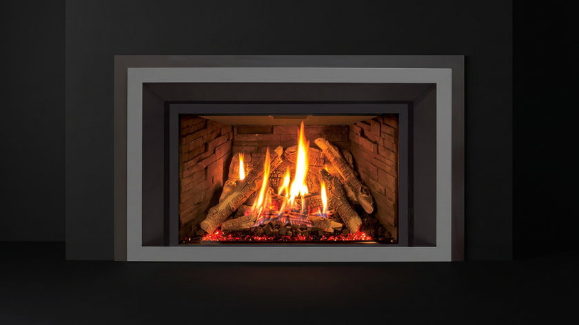 The Enviro EX35 — gas fireplace insert — burning in the black studio void