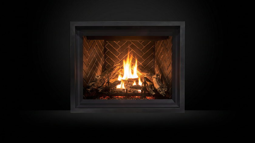 The Enviro G42 — gas fireplace — burning in the black studio void