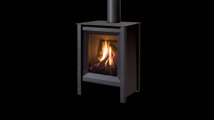 The Enviro S20 — freestanding gas stove — burning in the black studio void