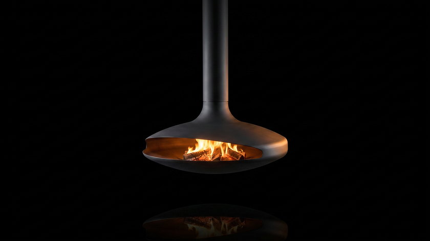 The Gyrofocus — wood   the flagship — burning in the black studio void