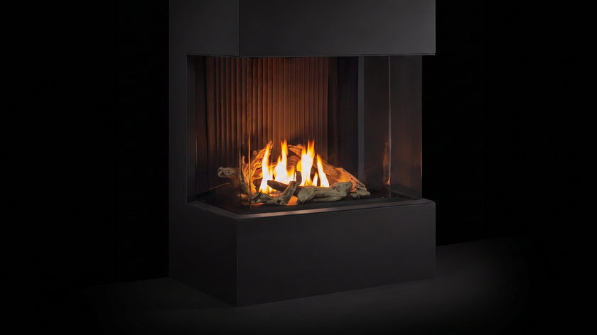 The Urbana U30 Bay — 3-sided gas fireplace — burning in the black studio void