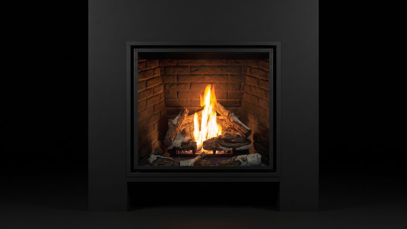 The Urbana U44 Outdoor — outdoor gas fireplace — burning in the black studio void