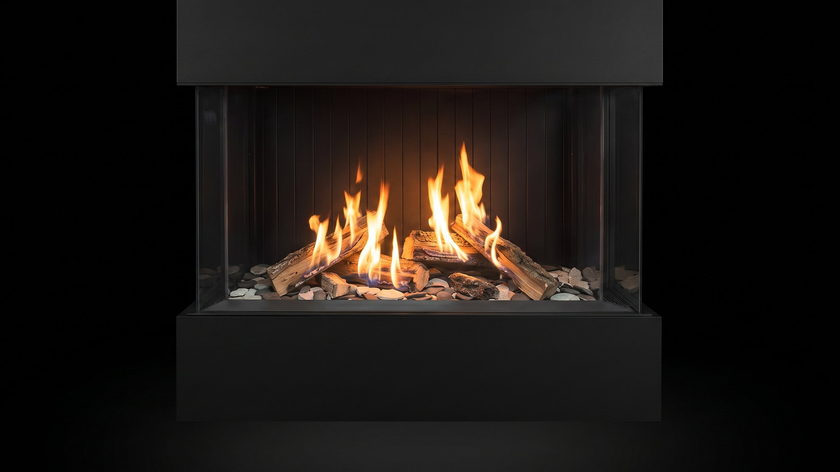 The Urbana U50 Tall Ultra — 3-sided gas fireplace — burning in the black studio void