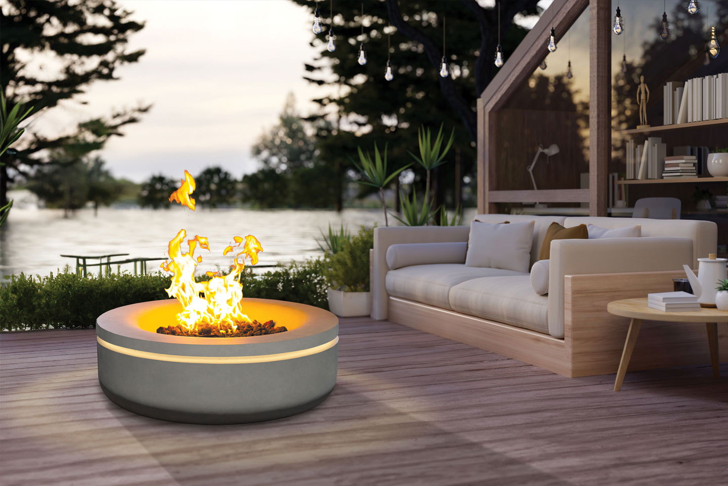 Halo concrete fire pit with its light ring on a lakeside deck
