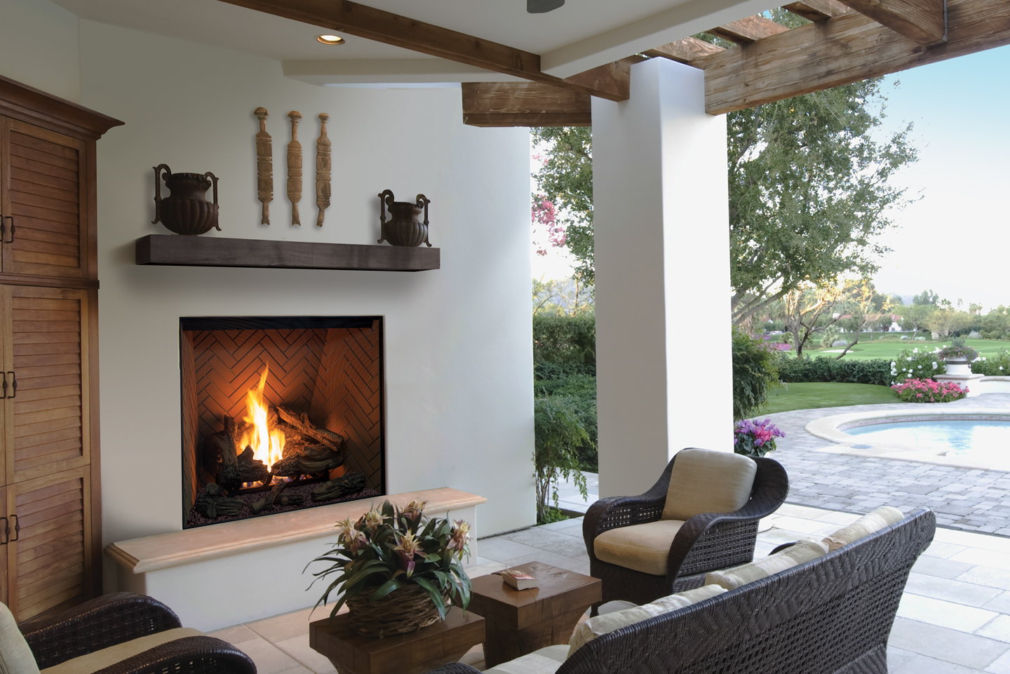 Urbana U44 Outdoor burning on a covered veranda with wicker chairs