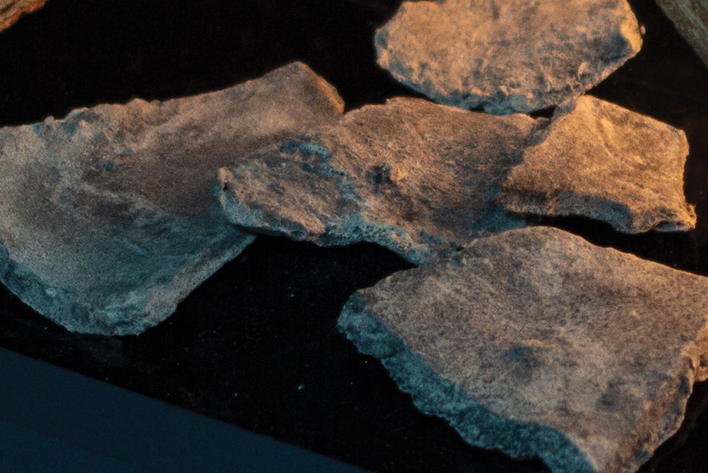 Slate-blue glass media of the Urbana U50 Linear, unlit