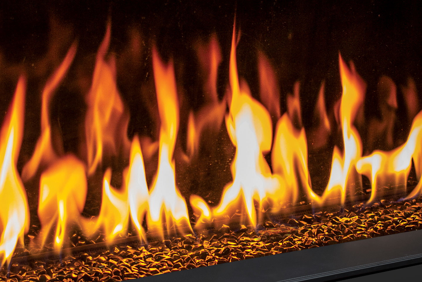 Flames over the glowing ember bed of the Urbana U50 Linear