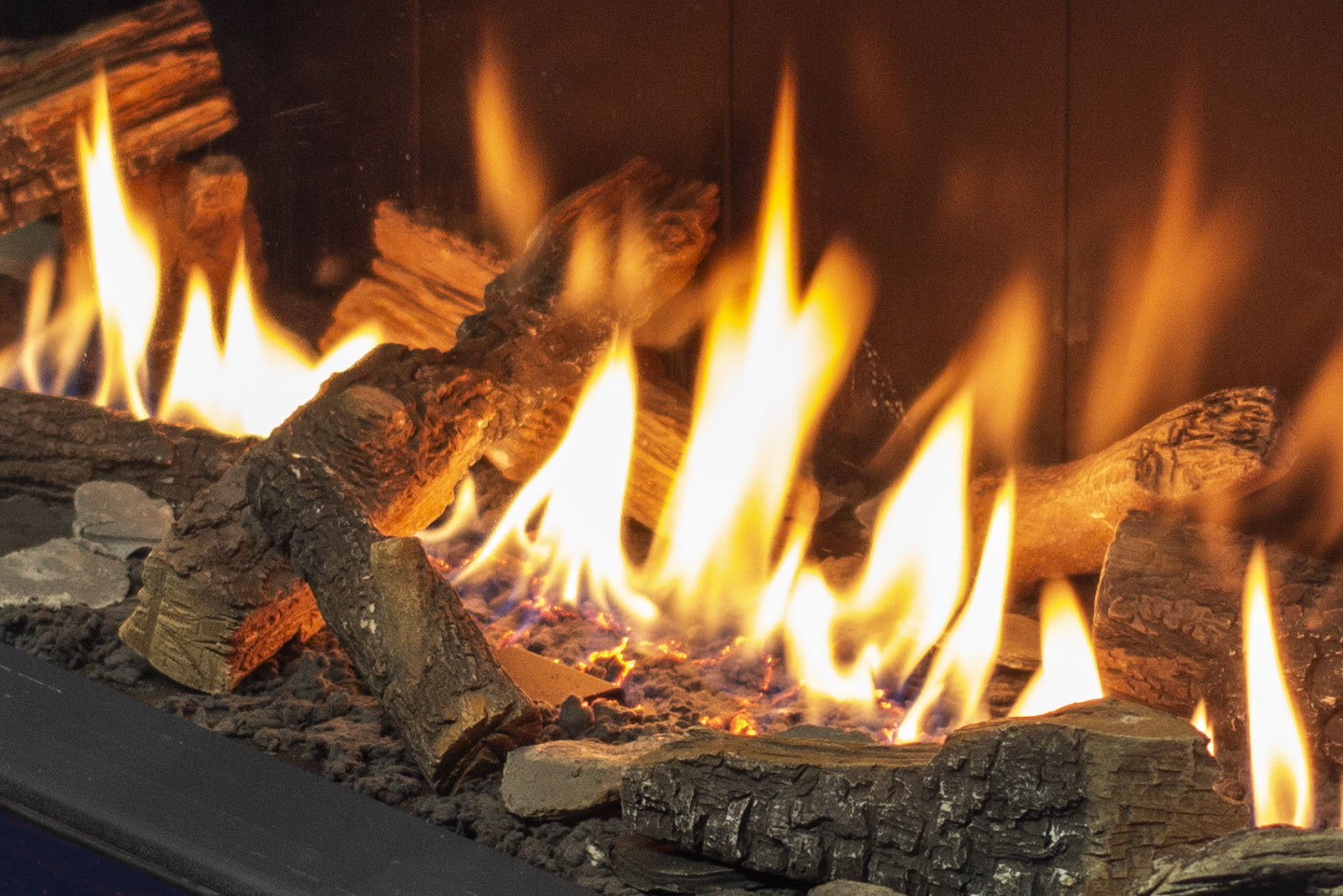 Birch logs burning in the Urbana U50 Tall Linear