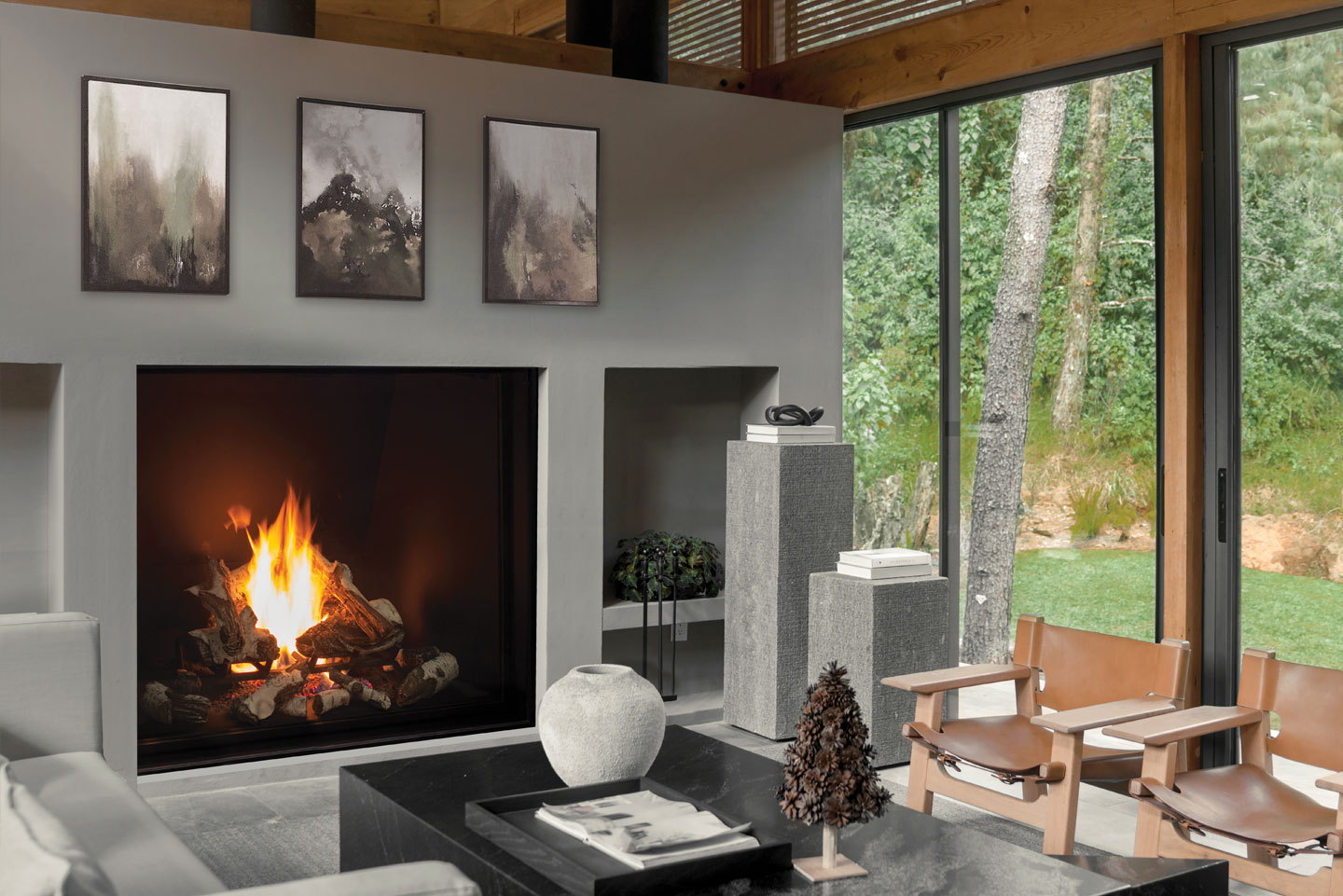 Urbana U55 alight in a timber room with forest views
