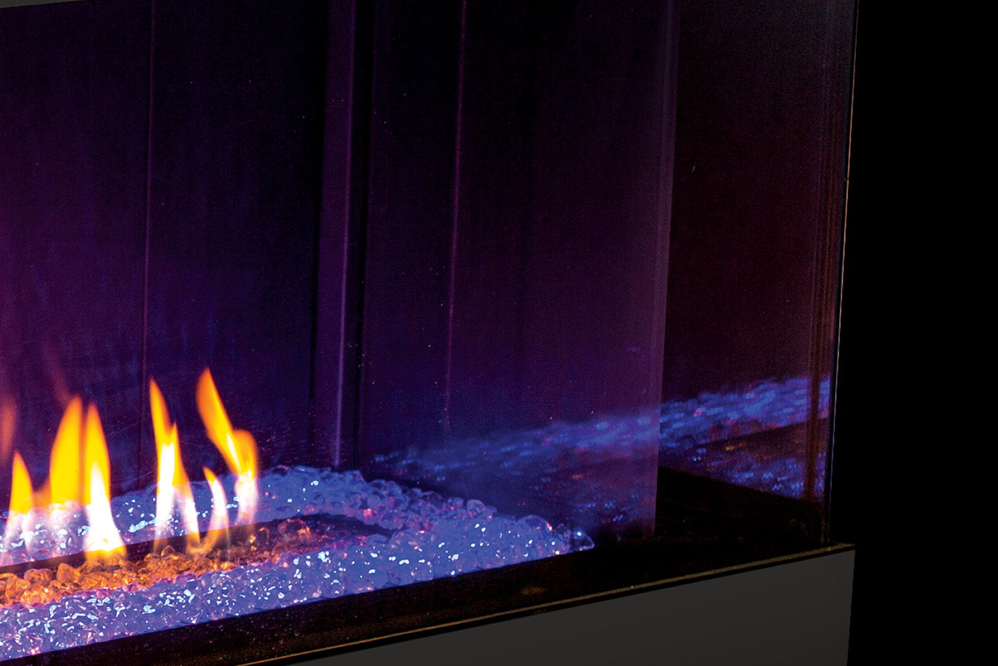 Violet glass media glowing in the Urbana U70 Linear at night
